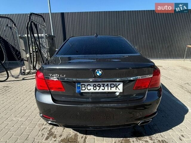 Черный БМВ 7 Серия, объемом двигателя 2.98 л и пробегом 276 тыс. км за 13000 $, фото 1 на Automoto.ua
