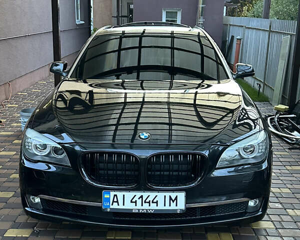 Черный БМВ 7 Серия, объемом двигателя 2.98 л и пробегом 147 тыс. км за 18000 $, фото 1 на Automoto.ua