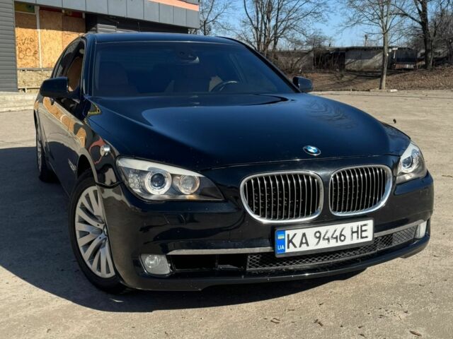 Черный БМВ 7 Серия, объемом двигателя 4.4 л и пробегом 208 тыс. км за 260 $, фото 1 на Automoto.ua