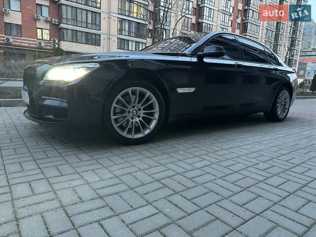 Черный БМВ 7 Серия, объемом двигателя 2.98 л и пробегом 285 тыс. км за 15900 $, фото 1 на Automoto.ua