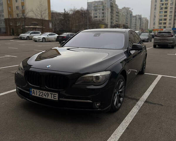 Черный БМВ 7 Серия, объемом двигателя 2.99 л и пробегом 302 тыс. км за 20000 $, фото 1 на Automoto.ua