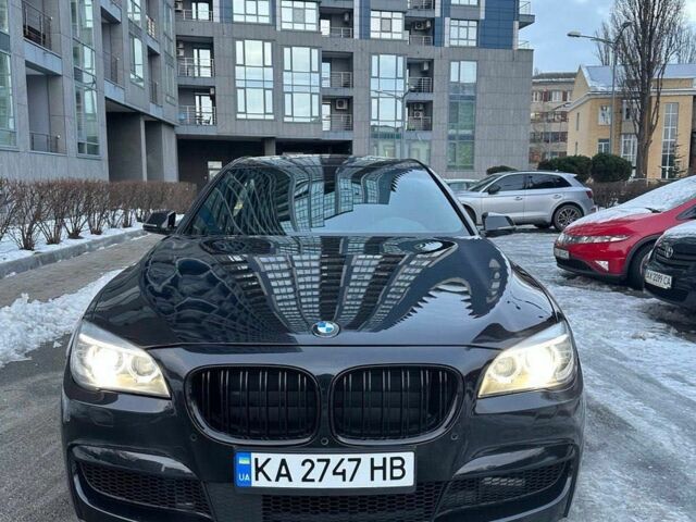 Черный БМВ 7 Серия, объемом двигателя 3 л и пробегом 157 тыс. км за 14900 $, фото 1 на Automoto.ua
