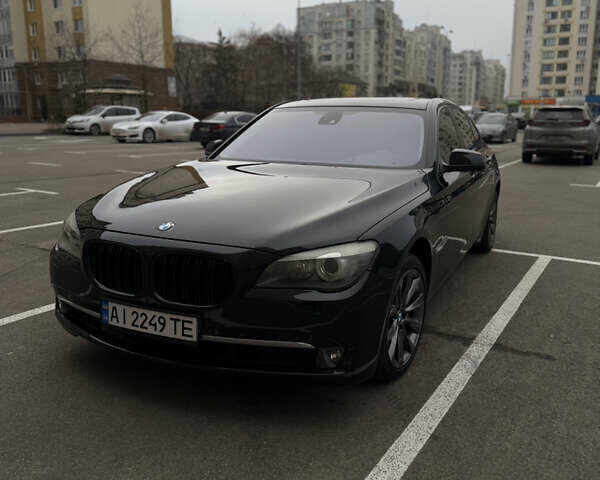 Чорний БМВ 7 Серія, об'ємом двигуна 2.99 л та пробігом 304 тис. км за 18000 $, фото 1 на Automoto.ua