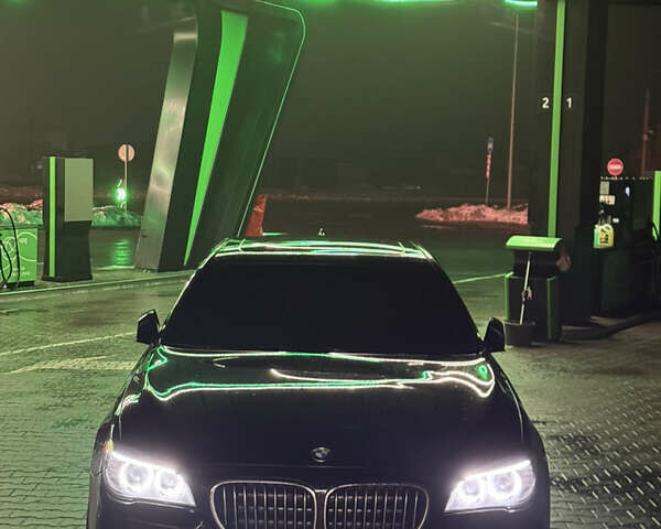 Чорний БМВ 7 Серія, об'ємом двигуна 2.98 л та пробігом 212 тис. км за 22000 $, фото 1 на Automoto.ua