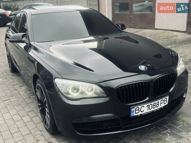 Черный БМВ 7 Серия, объемом двигателя 2.98 л и пробегом 285 тыс. км за 12500 $, фото 1 на Automoto.ua