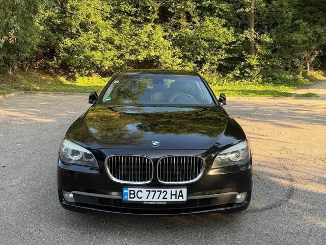 Чорний БМВ 7 Серія, об'ємом двигуна 3 л та пробігом 325 тис. км за 19000 $, фото 1 на Automoto.ua