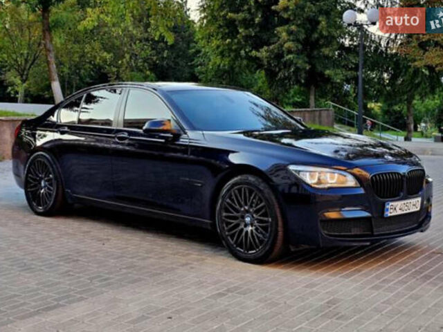 Чорний БМВ 7 Серія, об'ємом двигуна 2.99 л та пробігом 289 тис. км за 25000 $, фото 1 на Automoto.ua