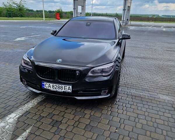 Черный БМВ 7 Серия, объемом двигателя 3 л и пробегом 195 тыс. км за 26500 $, фото 1 на Automoto.ua