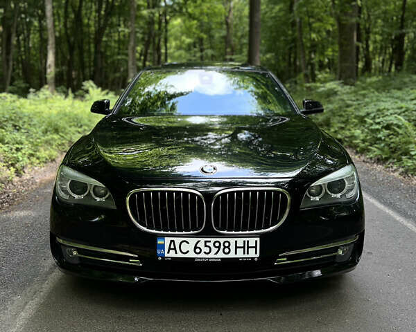 Черный БМВ 7 Серия, объемом двигателя 2.98 л и пробегом 244 тыс. км за 21000 $, фото 1 на Automoto.ua