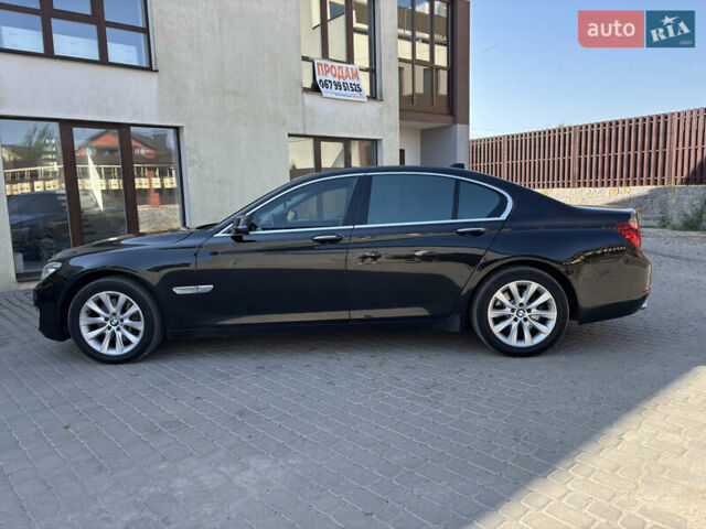 Черный БМВ 7 Серия, объемом двигателя 3 л и пробегом 196 тыс. км за 18600 $, фото 1 на Automoto.ua
