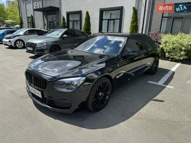 Черный БМВ 7 Серия, объемом двигателя 2.98 л и пробегом 281 тыс. км за 17777 $, фото 1 на Automoto.ua