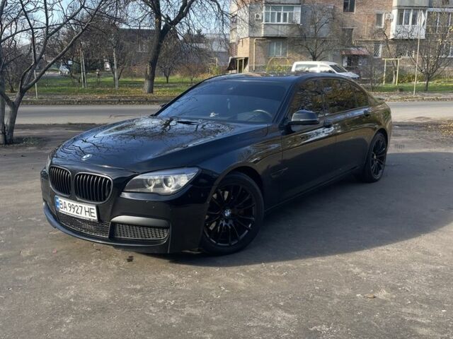 Чорний БМВ 7 Серія, об'ємом двигуна 3 л та пробігом 130 тис. км за 18500 $, фото 1 на Automoto.ua