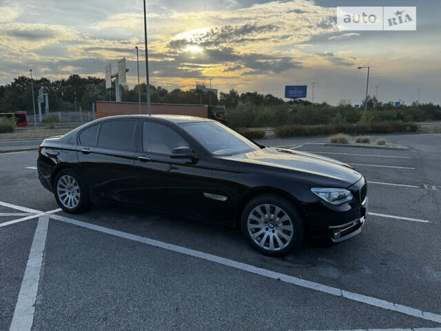 Черный БМВ 7 Серия, объемом двигателя 2.99 л и пробегом 225 тыс. км за 20000 $, фото 1 на Automoto.ua