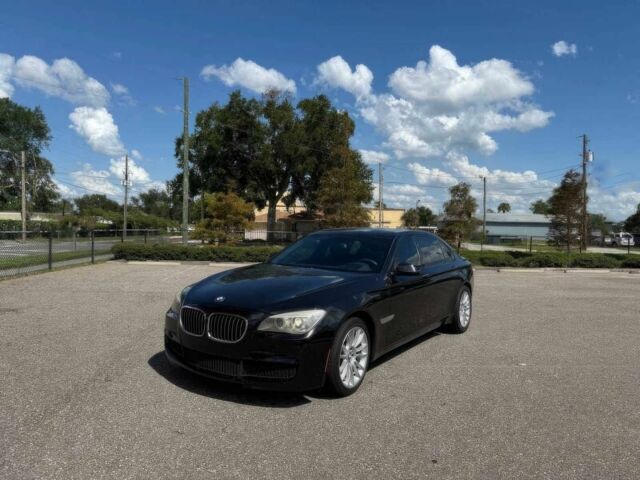 Черный БМВ 7 Серия, объемом двигателя 3 л и пробегом 80 тыс. км за 4400 $, фото 1 на Automoto.ua