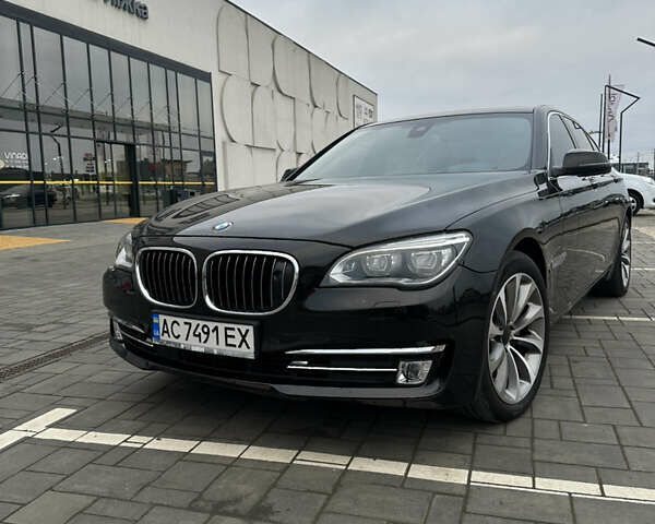 Черный БМВ 7 Серия, объемом двигателя 2.99 л и пробегом 275 тыс. км за 23500 $, фото 1 на Automoto.ua