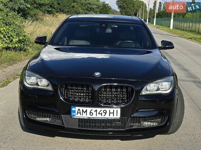 Черный БМВ 7 Серия, объемом двигателя 4.4 л и пробегом 370 тыс. км за 25000 $, фото 1 на Automoto.ua