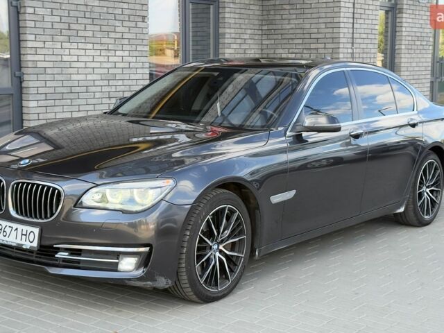 Черный БМВ 7 Серия, объемом двигателя 4.4 л и пробегом 150 тыс. км за 19500 $, фото 1 на Automoto.ua