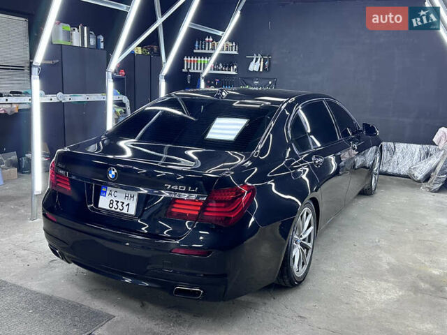 Черный БМВ 7 Серия, объемом двигателя 2.98 л и пробегом 245 тыс. км за 14000 $, фото 1 на Automoto.ua