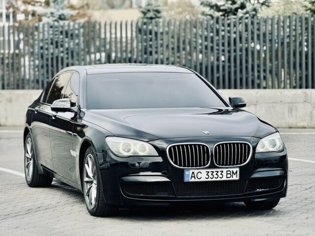 Черный БМВ 7 Серия, объемом двигателя 3 л и пробегом 250 тыс. км за 14000 $, фото 1 на Automoto.ua