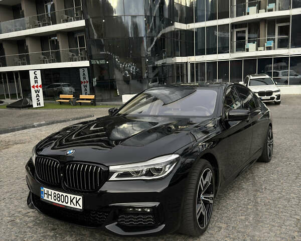 Черный БМВ 7 Серия, объемом двигателя 4.39 л и пробегом 106 тыс. км за 32000 $, фото 1 на Automoto.ua