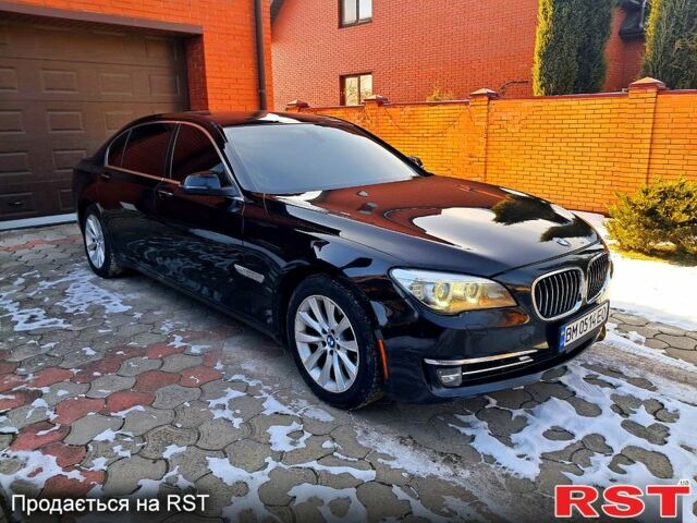 Черный БМВ 7 Серия, объемом двигателя 3 л и пробегом 23200 тыс. км за 21999 $, фото 1 на Automoto.ua
