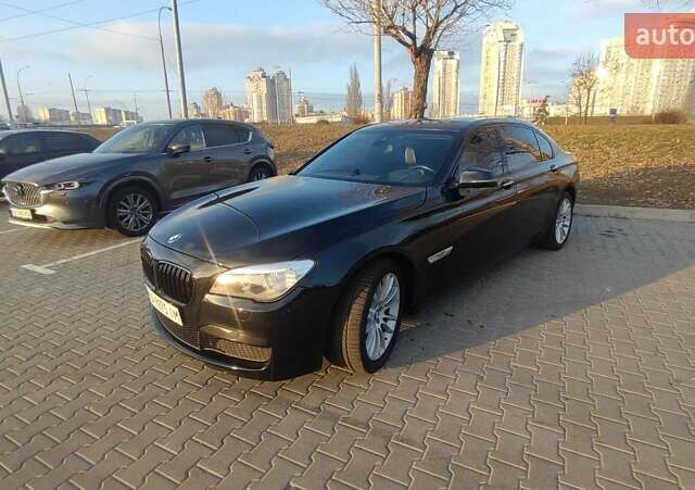 Чорний БМВ 7 Серія, об'ємом двигуна 2.98 л та пробігом 125 тис. км за 18000 $, фото 1 на Automoto.ua