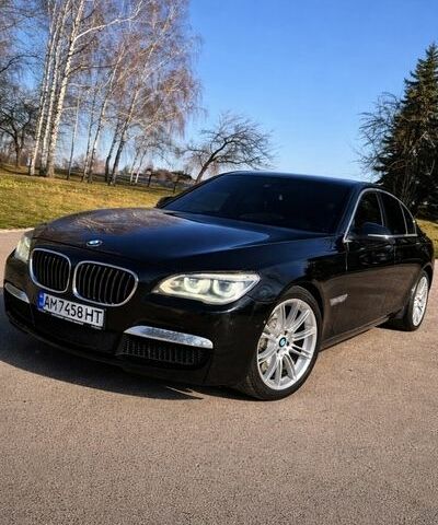 Черный БМВ 7 Серия, объемом двигателя 3 л и пробегом 200 тыс. км за 19900 $, фото 1 на Automoto.ua