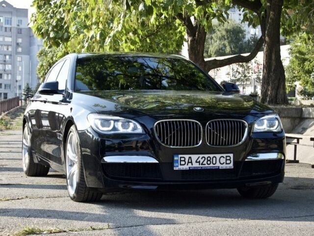 Чорний БМВ 7 Серія, об'ємом двигуна 3 л та пробігом 89 тис. км за 22550 $, фото 1 на Automoto.ua