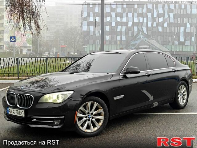 Черный БМВ 7 Серия, объемом двигателя 3 л и пробегом 200 тыс. км за 15500 $, фото 1 на Automoto.ua