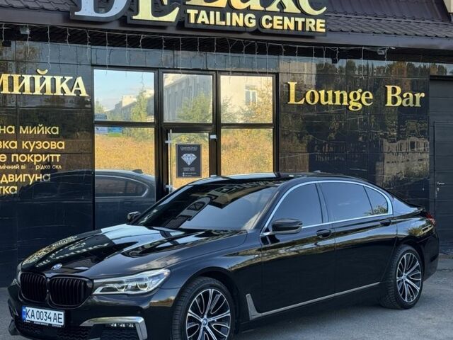 Черный БМВ 7 Серия, объемом двигателя 4.4 л и пробегом 160 тыс. км за 26500 $, фото 1 на Automoto.ua