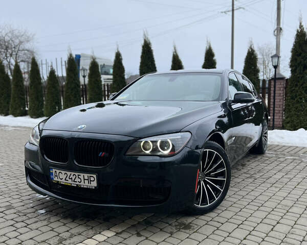 Чорний БМВ 7 Серія, об'ємом двигуна 3 л та пробігом 150 тис. км за 15900 $, фото 1 на Automoto.ua