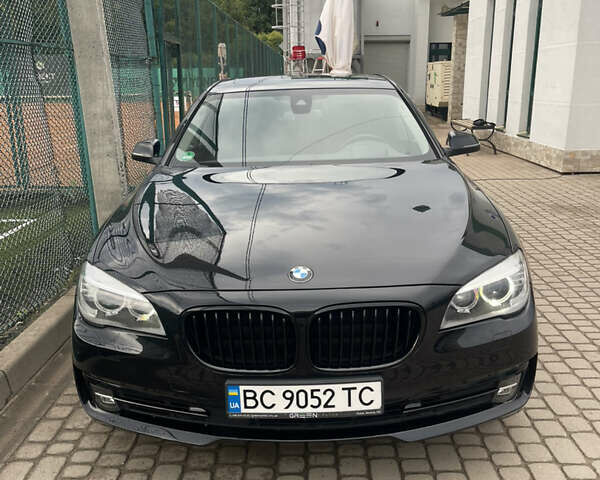 Черный БМВ 7 Серия, объемом двигателя 2.99 л и пробегом 172 тыс. км за 26900 $, фото 1 на Automoto.ua