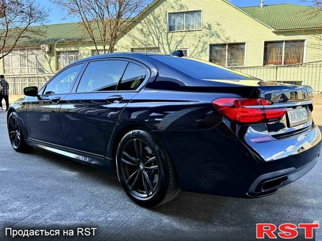 Чорний БМВ 7 Серія, об'ємом двигуна 4.4 л та пробігом 178 тис. км за 35999 $, фото 1 на Automoto.ua