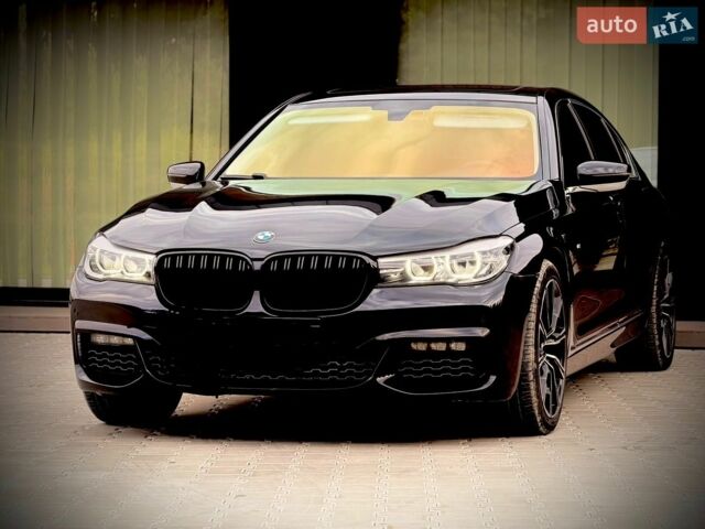 Чорний БМВ 7 Серія, об'ємом двигуна 3 л та пробігом 218 тис. км за 27900 $, фото 1 на Automoto.ua