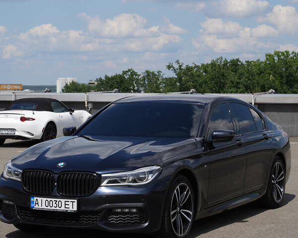 Черный БМВ 7 Серия, объемом двигателя 2.99 л и пробегом 170 тыс. км за 47500 $, фото 1 на Automoto.ua