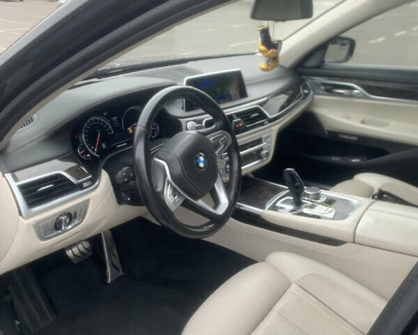 Чорний БМВ 7 Серія, об'ємом двигуна 3 л та пробігом 78 тис. км за 33000 $, фото 1 на Automoto.ua