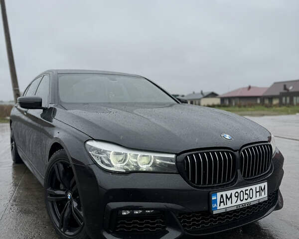 Черный БМВ 7 Серия, объемом двигателя 3 л и пробегом 120 тыс. км за 38000 $, фото 1 на Automoto.ua
