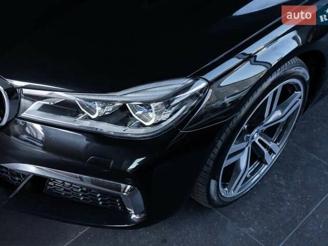 Черный БМВ 7 Серия, объемом двигателя 2 л и пробегом 110 тыс. км за 35000 $, фото 1 на Automoto.ua