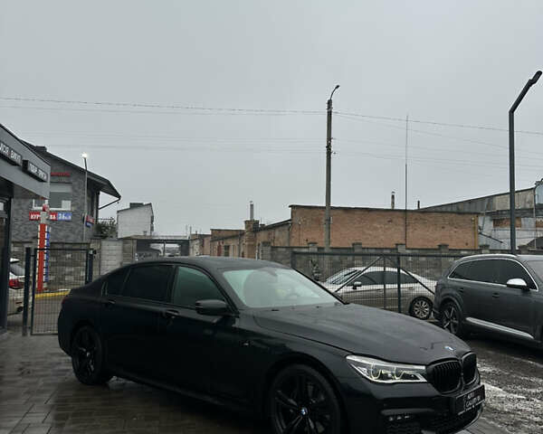 Чорний БМВ 7 Серія, об'ємом двигуна 3 л та пробігом 220 тис. км за 34888 $, фото 1 на Automoto.ua