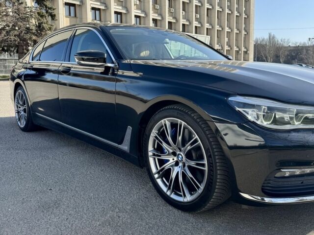 Черный БМВ 7 Серия, объемом двигателя 4.4 л и пробегом 120 тыс. км за 29999 $, фото 1 на Automoto.ua