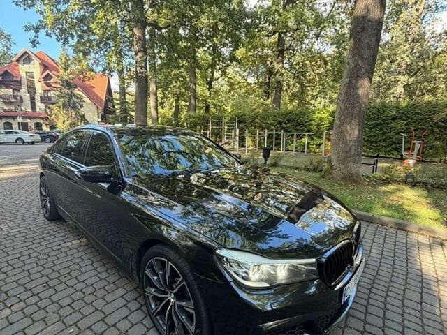Черный БМВ 7 Серия, объемом двигателя 2.98 л и пробегом 200 тыс. км за 26500 $, фото 1 на Automoto.ua