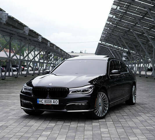 Черный БМВ 7 Серия, объемом двигателя 3 л и пробегом 165 тыс. км за 28000 $, фото 1 на Automoto.ua