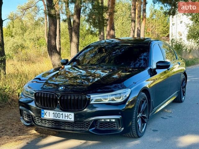 Чорний БМВ 7 Серія, об'ємом двигуна 4.4 л та пробігом 205 тис. км за 23500 $, фото 1 на Automoto.ua