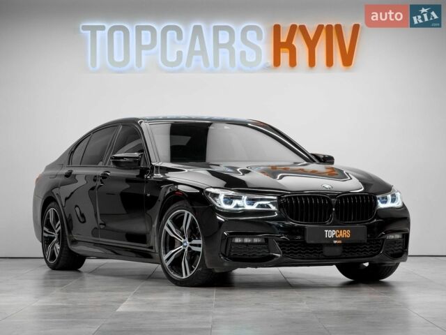 Черный БМВ 7 Серия, объемом двигателя 2.99 л и пробегом 215 тыс. км за 34500 $, фото 1 на Automoto.ua