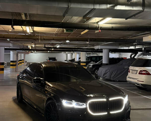 Черный БМВ 7 Серия, объемом двигателя 2.99 л и пробегом 125 тыс. км за 55600 $, фото 1 на Automoto.ua