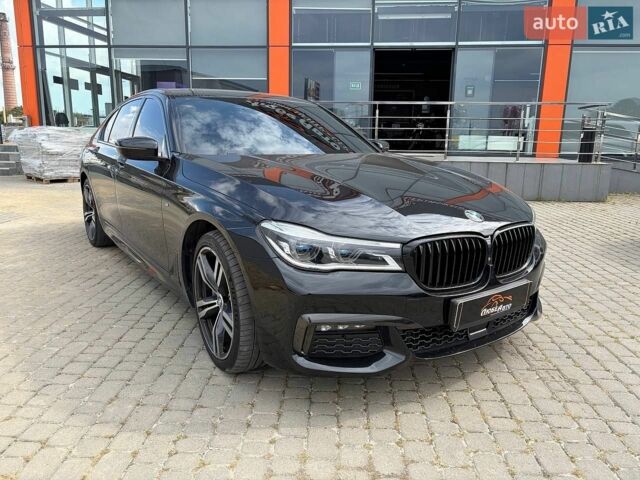 Черный БМВ 7 Серия, объемом двигателя 2.99 л и пробегом 160 тыс. км за 34000 $, фото 1 на Automoto.ua