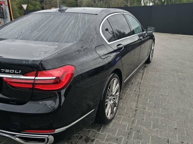 Черный БМВ 7 Серия, объемом двигателя 4.39 л и пробегом 131 тыс. км за 31000 $, фото 1 на Automoto.ua