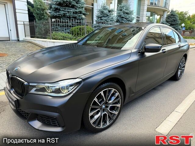 Черный БМВ 7 Серия, объемом двигателя 4.4 л и пробегом 229 тыс. км за 29500 $, фото 1 на Automoto.ua
