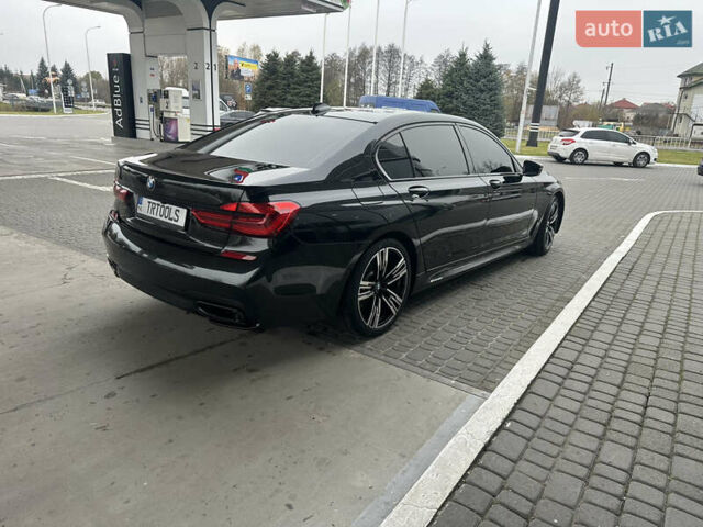 Чорний БМВ 7 Серія, об'ємом двигуна 3 л та пробігом 179 тис. км за 35000 $, фото 1 на Automoto.ua