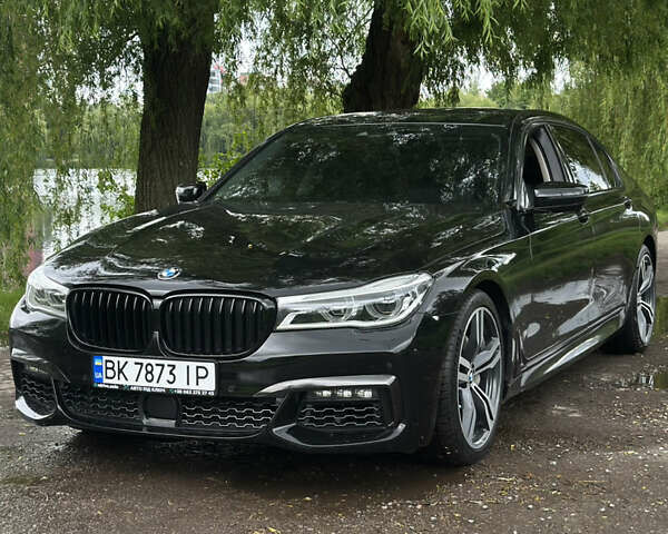 Черный БМВ 7 Серия, объемом двигателя 2.98 л и пробегом 160 тыс. км за 30000 $, фото 1 на Automoto.ua